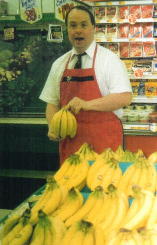 Brett Barksdale working at a grocery store 